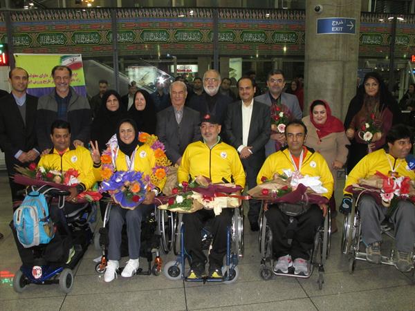 در میان استقبال دبیر کل کمیته ملی المپیک؛تیم های ملی تیراندازی با کمان جانبازان و معلولین و ووشو وارد کشور شدند
