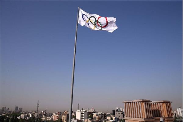 همزمان با گرامیداشت روز المپیک انجام شد؛اهتزاز بزرگترین پرچم IOC در محل کمیته ملی المپیک ایران