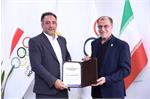 اهداء مدرک مدرسی سولیداریتی توسط رئیس کمیته ملی المپیک به دکتر بالزاده