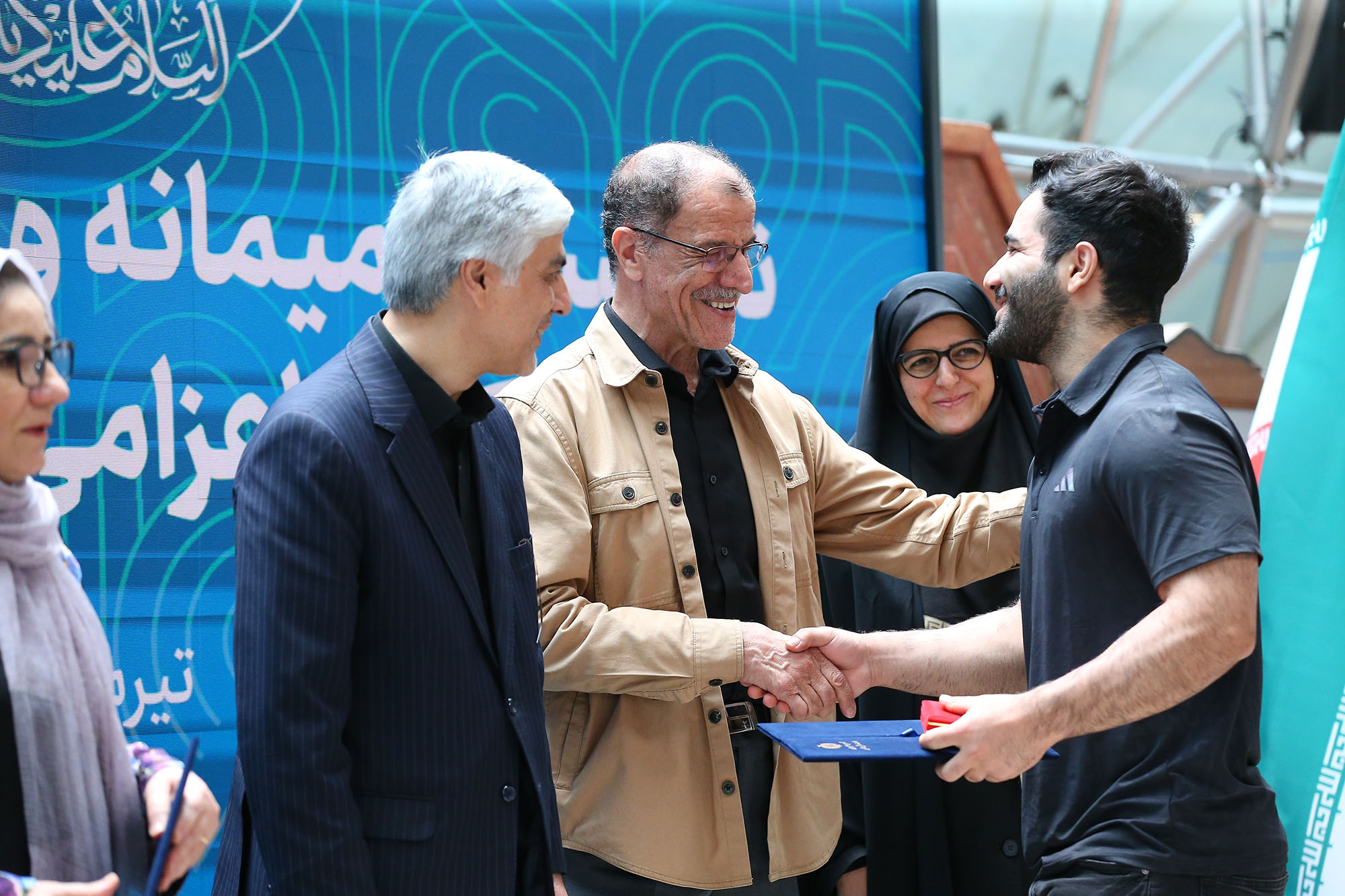 مراسم بدرقه کاروان ورزشی اعزامی به بازی های المپیک پاریس و امضا تفاهم نامه ورزشی با آستان قدس رضوی 13