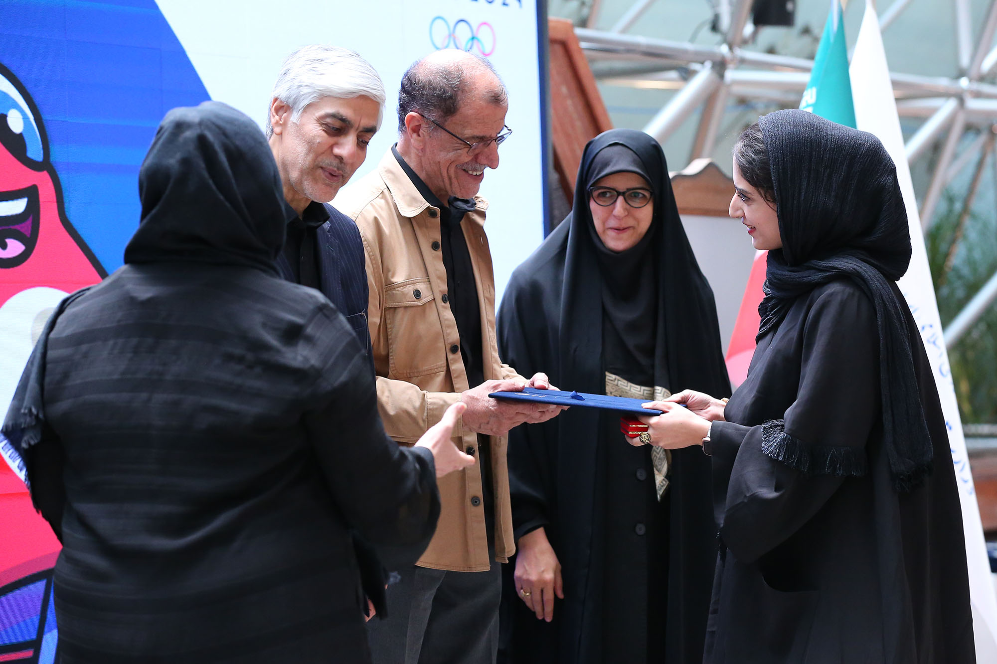 مراسم بدرقه کاروان ورزشی اعزامی به بازی های المپیک پاریس و امضا تفاهم نامه ورزشی با آستان قدس رضوی 16